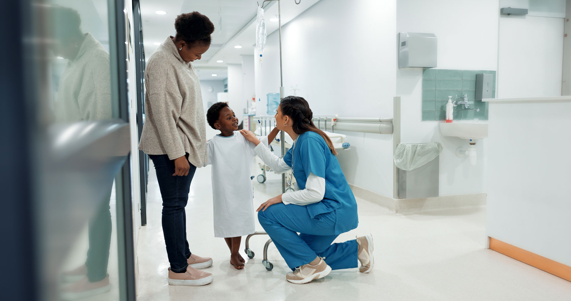 Nurse, Child and Parent together in Hospital